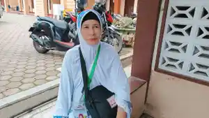 Henniwati-Jemaah-calon-haji-asal-Deliserdang-yang-sempat-tertunda-keberangkatannya.jpg