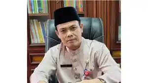 Kepala-BKPSDM-Kabupaten-Pelalawan-Riau-Darlis-MSi.jpg
