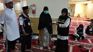 Caption-Jamaah-Kloter-18-yang-merupakan-gabungan-Jamaah-Haji-Sulut-dan-Balikpapan.jpg