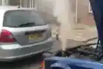 Baha-membuka-tutup-radiator-yang-overheat.jpg