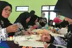 Peringati Hari Guru Nasional, Belasan Pengajar Sekolah Luar Biasa Siswa Budhi Belajar Melukis