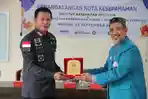 Penandatanganan-Nota-Kesepahaman-dengan-Rektor-Institut-Kesehatan-Helvetia.jpg
