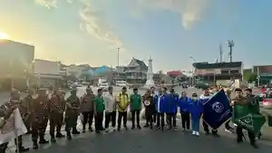 Pemuda-Lintas-Iman-DIY-Gelar-Aksi-Damai-di-Tugu-Jogja-Serukan-Persatuan.jpg