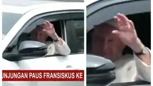 Paus-Fransiskus-melambaikan-tangan-ke-masyarakat.jpg