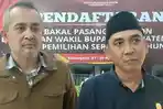 Komisioner-KPUD-Karo-divisi-teknis-penyelenggaraan-Hendra-Lias-Sinulingga-kanan.jpg