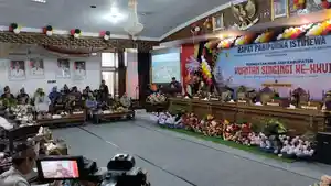 Bupati-Kuansing-Suhardiman-Amby-menyampaikan-kata-sambutannya.jpg