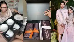 Souvenir-pertama-berisi-handuk-couple-dengan-bordiran-mewah-serta-inisial.jpg