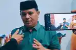 Juru-bicara-dan-kuasa-hukum-pasangan-Ismet-Mile-dan-Risman-Tolingguhu-Fanly-Katili.jpg