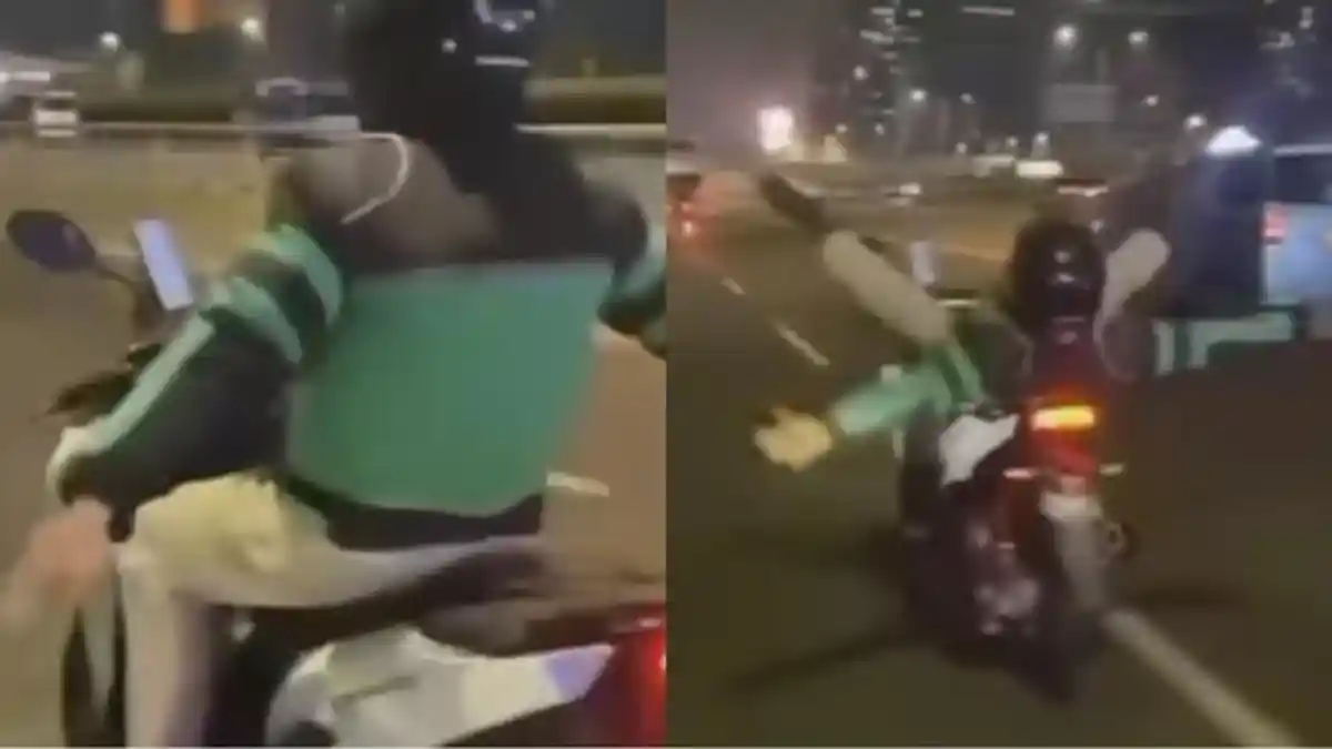 Driver Ojol Lakukan Atraksi Berbahaya di Jalan Raya, Nekat Rebahan di Motor yang Sedang Berjalan
