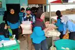 mahasiswa-uin-walisongo-membantu-pembagian-sembako.jpg