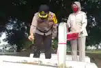 kapolres-kotamobagu-akbp-prasetya-sejati-sik-taburi-bunga-makam-pahlawan.jpg