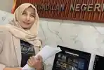 advokat-Wiwik-Tri-Haryati-saat-melayangkan-gugatan-pra-peradilan.jpg