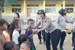 HIBUR-ANAK-Sejumlah-anggota-Polwan-Polres-Flores-Timur-saat-bermain-Bersama-anak-anak.jpg