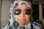 Wanita-berhijab-makan-daging-babi.jpg