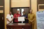 PLN-UP3-Binjai-menandatangani-MoU-bersama-Pemerintah-Kabupaten-Langkat-dan-Perum-BULOG.jpg