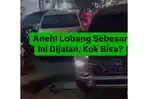 Satu-unit-mobil-pribadi-yang-melintas-di-jalan.jpg