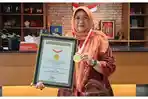 2026-05-14-Guru-Besar-Fakultas-Kedokteran-Unhas-Prof-Nurpudji-Astuti-Daud.jpg