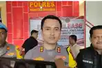 AKBP-Hidayat-Perdana-diapit-Kasat.jpg
