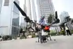 Penyemprotan Disinfektan Memakai Drone di Kawasan Sudirman