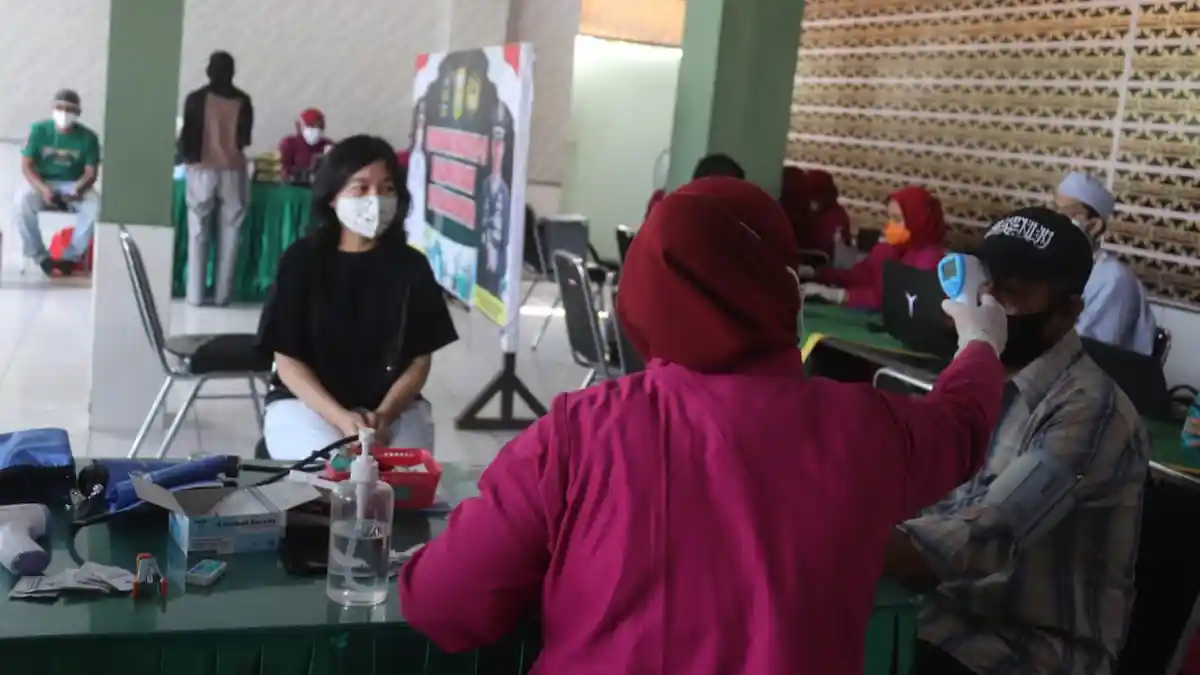 Warga Antusias Lakukan Vaksinasi Covid 19 di Kodim 0410