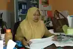 caption-kepala-dp3a-enrekang-sawaliah-baharuddin_20180918_154036.jpg