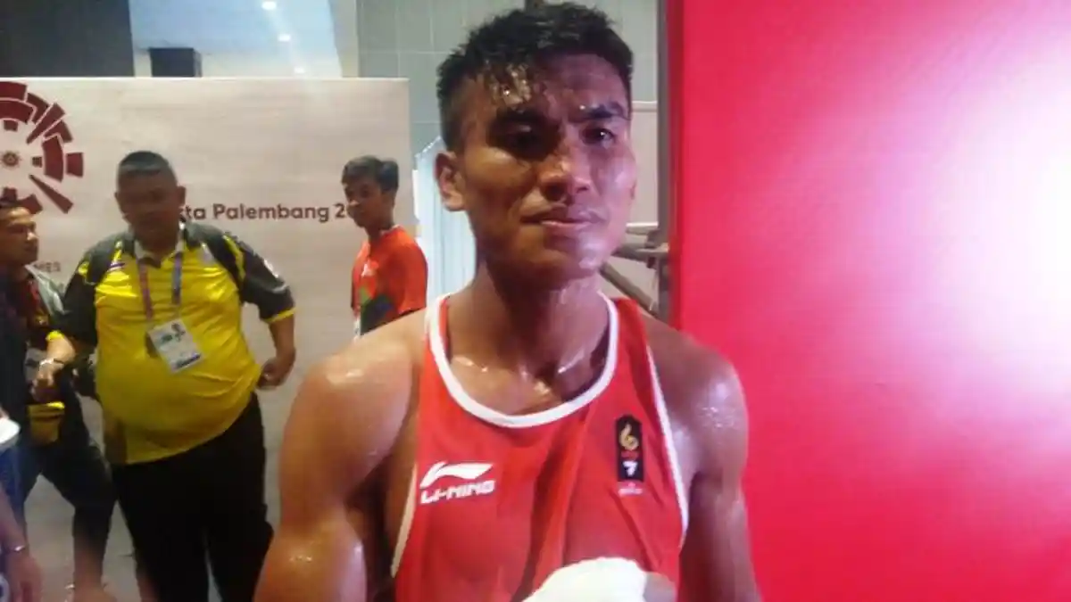 Tinju Asian Games 2018: Farrand Papendang Melaju ke Perempat Final