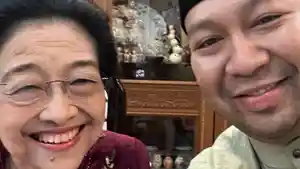 Didit-Megawati-berfoto.jpg