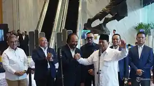 Ketua-Umum-Partai-Nasdem-Surya-Paloh-bersama-Calon-Presiden-Prabowo-Subianto.jpg