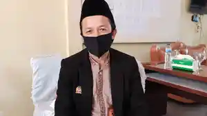 ketua-kpu-basel-amri-fly.jpg