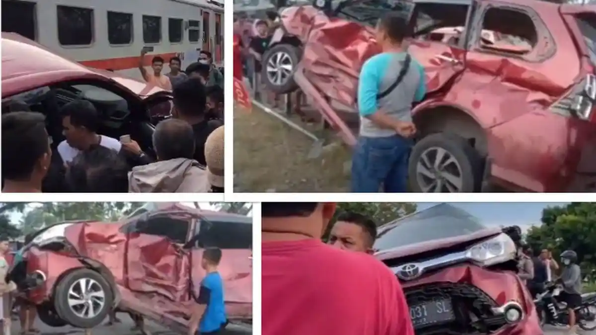 Kecelakaan Mobil Tertabrak Kereta Hingga Ringsek Bertengger di Atas Pembatas Jalan