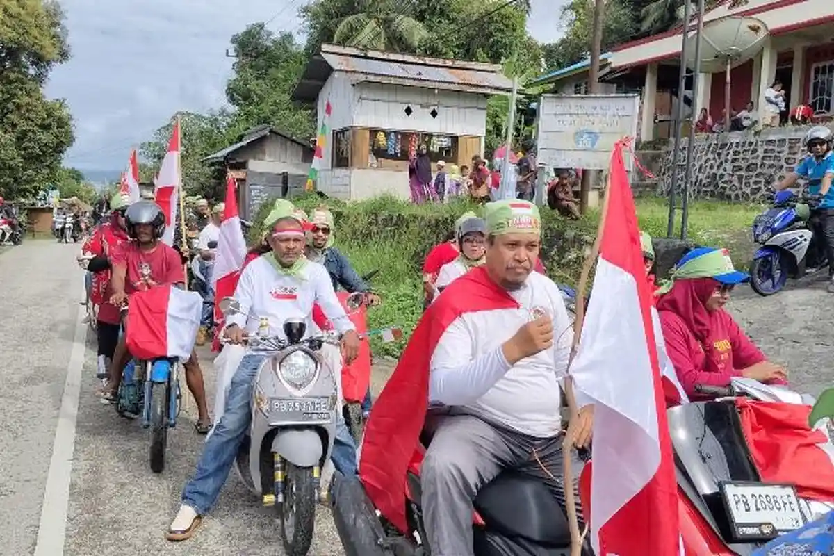 Ribuan Warga Ikuti Kirab Merah Putih Menyusuri Jalan Utama di Kota Perjuangan Fakfak