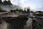 Melihat Kerusakan Kilang Minyak Kuba yang Terbakar