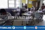 delapan-siswa-smp-lb-yayasan-pendidikan-tunas-bangsa-kota-malang-mengikuti-unas_20170508_155542.jpg