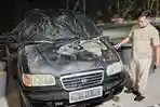 Mobil-sedan-milik-Taufik-Hidayat-terbakar.jpg