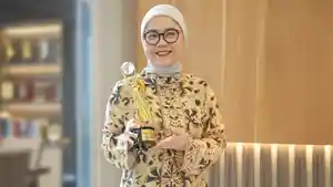 Direktur-Pegadaian-Raih-Penghargaan-Women-in-Business-Leadership-2026.jpg