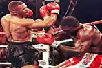 mike-tyson-kala-memukul-jatuh-lawannya.jpg