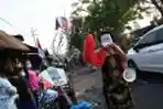 Seniman Ludruk Blusukan Pasar Ajak Warga Disiplin Bermasker