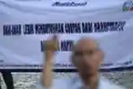 Spanduk Bertuliskan Himbuan Mudik Aman Dari Satgas PA