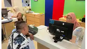 Suasana-layanan-di-Kantor-Disdukcapil-Kota-Pekanbaru-saat-WFH.jpg