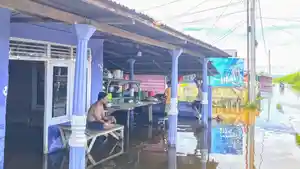 Kondisi-terkini-banjir-di-Desa-Hutadaa-Kecamatan-Telaga-Jaya.jpg