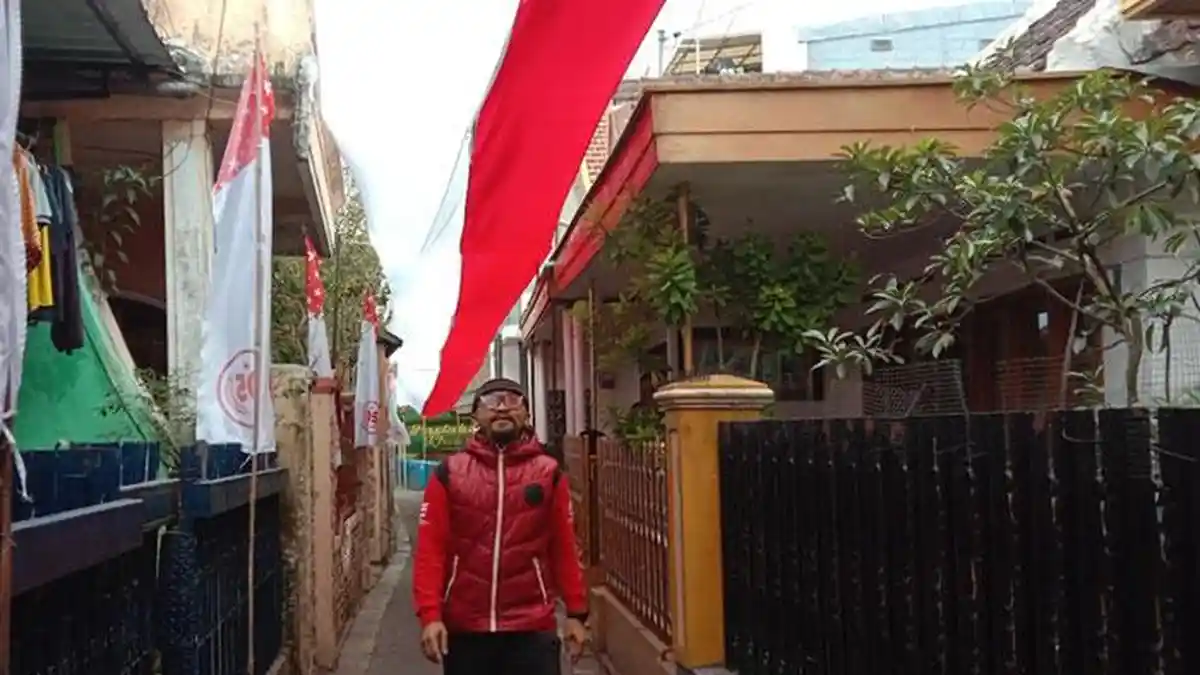 Wujud Semangat Gotong Royong, Bendera Merah Putih 80 Meter Terbentang di Kampung Bareng Kota Malang