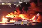 Pesawat-Japan-Airlines-terbakar-di-landasan-pacu-bandara-Haneda.jpg
