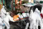 para-pekerja-medis-dilengkapi-pakaian-pelindung-34734.jpg