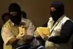 Gelar Barang Bukti Suap Ketua MK Akil Mochtar