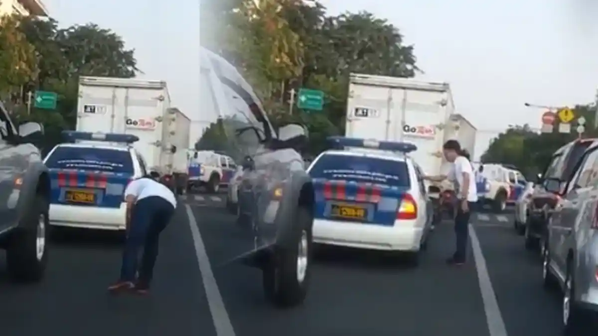 Viral Video Aksi Berani Pria Gondrong Kembalikan Sampah yang Diduga Dibuang Oknum Polisi di Jalan