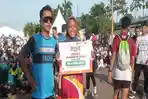 Bahagianya-GendisAulia-Remaja-15-Tahun-Juara-Pertama-Ampera-Tourism-Run-2024-Kategori-5K.jpg