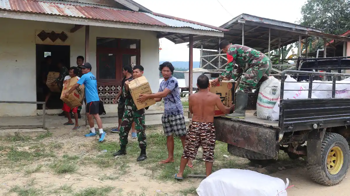 Sinergis Bersama Kades dam Warga, Satgas TMDD Kodim Sanggau Harap Program Selesai Tepat Waktu