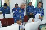 Bupati-Asahan-meninjau-pelaksanaan-ANBK-Tahun-2023-Tingkat-SMP-di-UPTD-SMP-Negeri-7-Kisaran.jpg