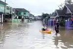 banjir-di-labuan-menghambat-bantuan-korban-tsunami_20181226_232629.jpg