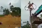Viral Peserta Panjat Pinang Tak Berani Turun, Bikin Panik Warga hingga Dievakuasi Pakai Alat Berat
